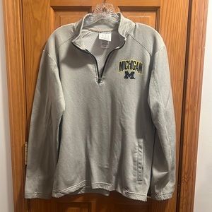 Men’s Grey Champion 3/4 Zip size Medium U of M sweatshirt. Previously worn.